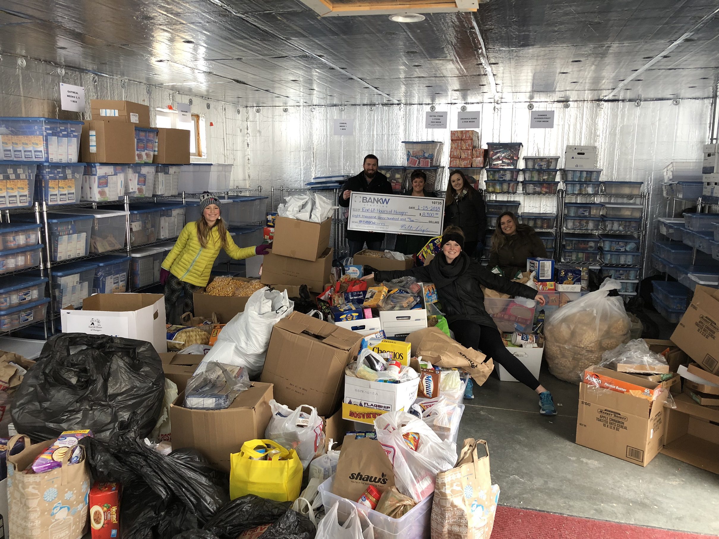 Bankw staffing and clients help to ‘end 68 hours of hunger’ by collecting nearly 3,500 pounds of food and over $8,000 in donations over the holidays